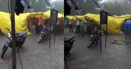 বরযাত্রীর কাছে হার মানল বৃষ্টিও, ত্রিপল মাথায় দিয়ে হাজির বিয়েতে বরযাত্রী