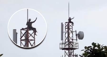 এ যেন সিনেমার দৃশ্য, বউ না এলে টাওয়ার থেকে নামবেন না যুবক যুবক