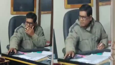 অফিসে বসে সরকারি কর্মকর্তার ধূমপান অফিসে বসে সরকারি কর্মকর্তার ধূমপান