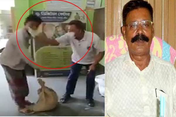 ত্রাণ নেওয়ার সময় ক্যামেরার দিকে না তাকানোয় চড়-থাপ্পড়