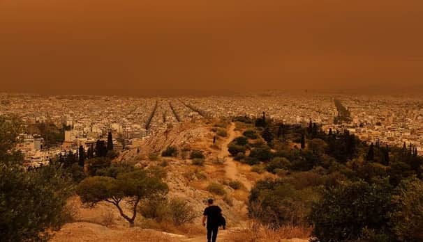 কমলা মেঘে ঢেকে গেল গ্রিসের আকাশ greece sky