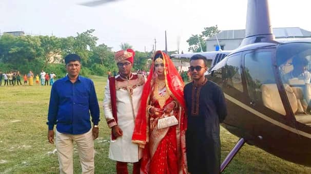 স্বপ্নপূরণে ছেলেকে হেলিকপ্টারে বিয়ে করালেন স্কুলশিক্ষক বাবা Munshi