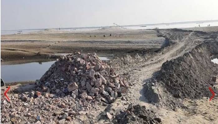 পদ্মার বুকে আওয়ামী লীগ নেতার রাস্তা নির্মাণ