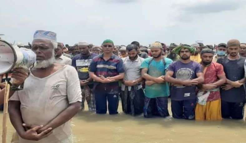 হাঁটু পানিতে ঈদের নামাজ, জানা গেল আসল রহস্য