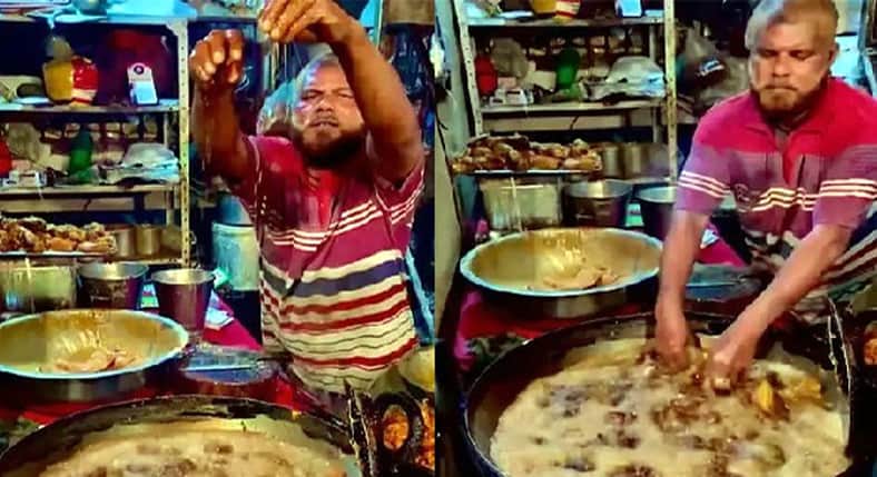 টগবগে ফুটন্ত তেলে হাত ডুবিয়ে মুরগি ভাজছেন এই ব্যক্তি ফুটন্ত তেলে হাত ডুবিয়ে