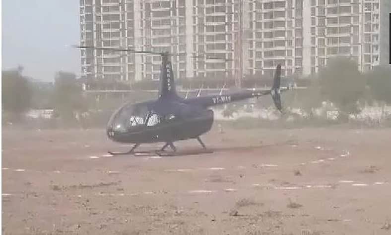 নবজাতক নাতনিকে বাড়িতে আনার জন্য হেলিকপ্টার ভাড়া করলেন কৃষক