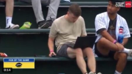 The Ultimate Remote Work Flex: Cubs Fan Goes Viral for Laptop Setup at Wrigley Field remote work