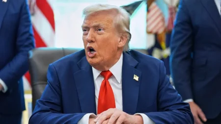 Trump Defends Russia Stance, Cites Tariffs in Reporter Exchange