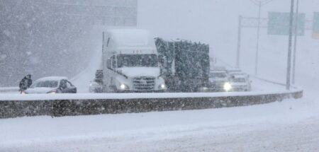 Midwest Snowstorm Paralyzes Travel, Snarls Highways and Cancels Flights