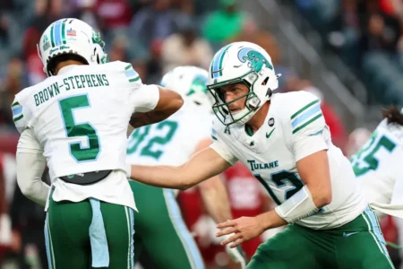 Tulane Football Playoff Hopes Bolstered by CFP Ranking Amid Coach's Criticism